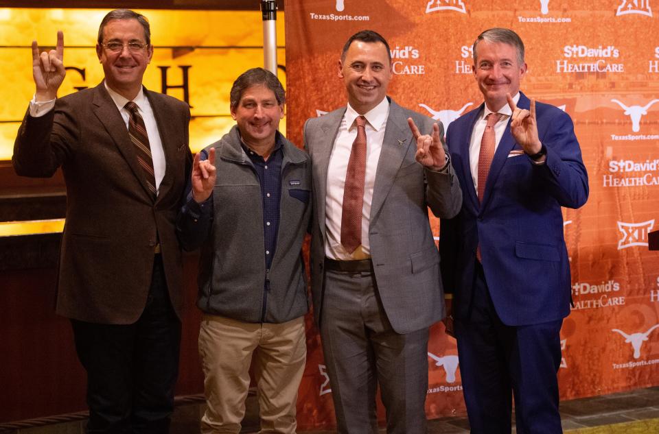 Texas football coach Steve Sarkisian, center, is pictured with, from left, athletic director Chris Del Conte, Board of Regents chairman Kevin Eltife and President Jay Hartzell at his introductory press conference in January of 2021. After a 12-2 season, the university has rewarded Sarkisian with a contract extension through 2030 that makes him the third-highest paid coach in college football.