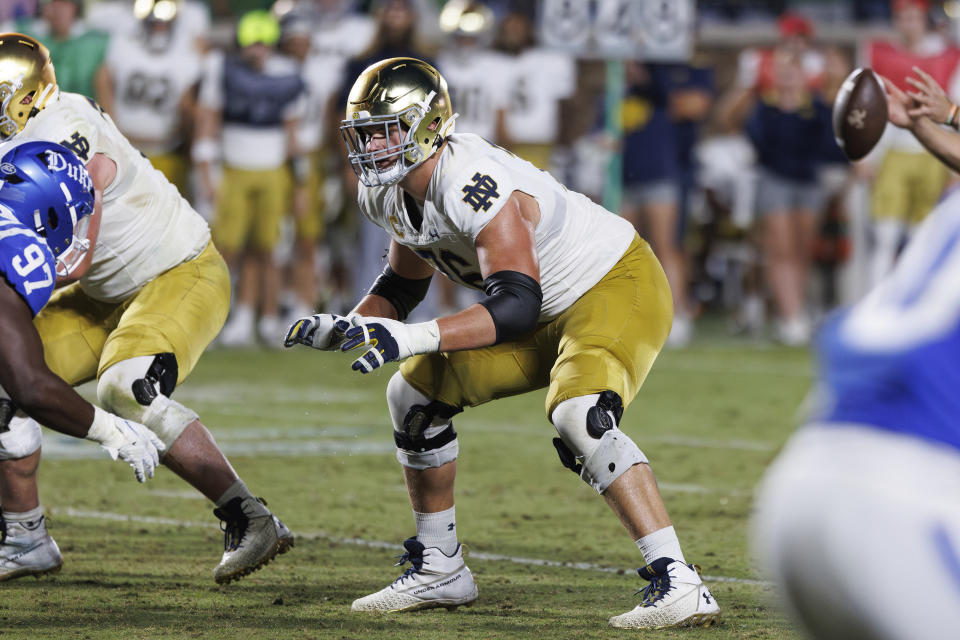 FILE - Notre Dame's Joe Alt (76) blocks in an NCAA college football game in Durham, N.C., Saturday, Sept. 30, 2023. Alt has been selected to The Associated Press midseason All-America team, Wednesday, Oct. 18, 2023.(AP Photo/Ben McKeown, File)