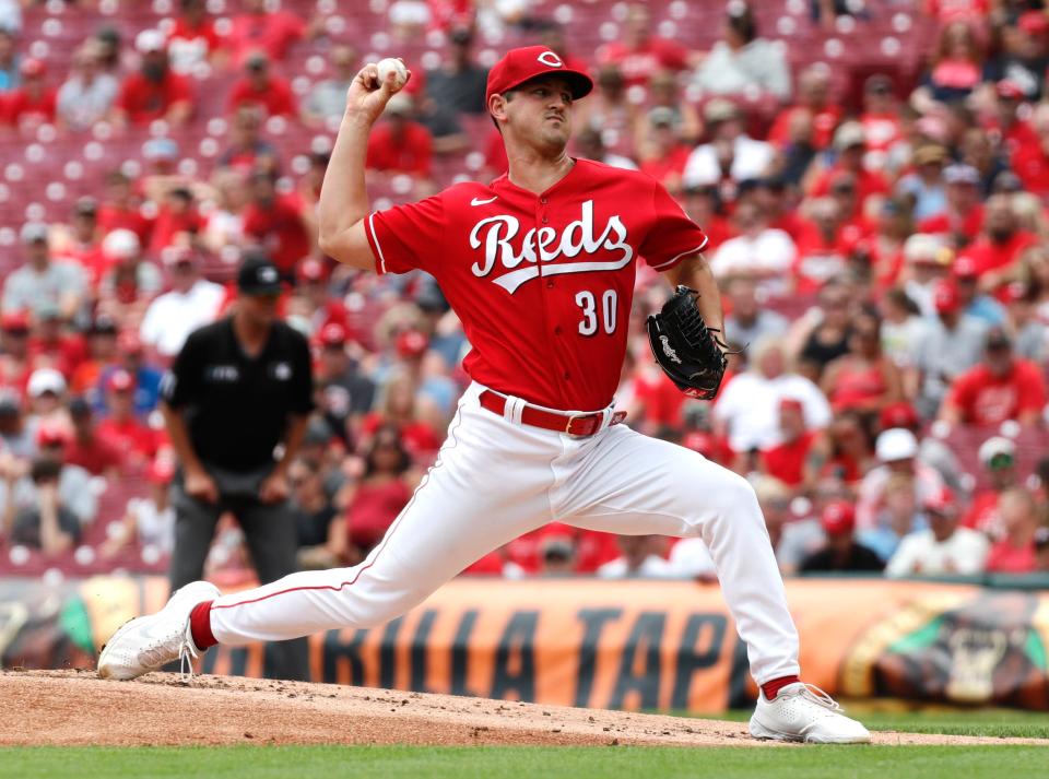 Jul 24, 2022; Cincinnati, Ohio, USA; Cincinnati Reds Tyler Mahle (30) throws a pitch against the St. Louis Cardinals during the second inning at Great American Ball Park. Mandatory Credit: David Kohl-USA TODAY Sports