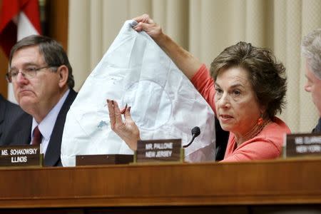 U.S. Representative Jan Schakowsky (D-IL) holds a defective air bag and shrapnel from its deployment during her opening remarks at a hearing of a House Energy and Commerce Subcommittee on the Takata airbag recall, on Capitol Hill in Washington June 2, 2015. REUTERS/Jonathan Ernst