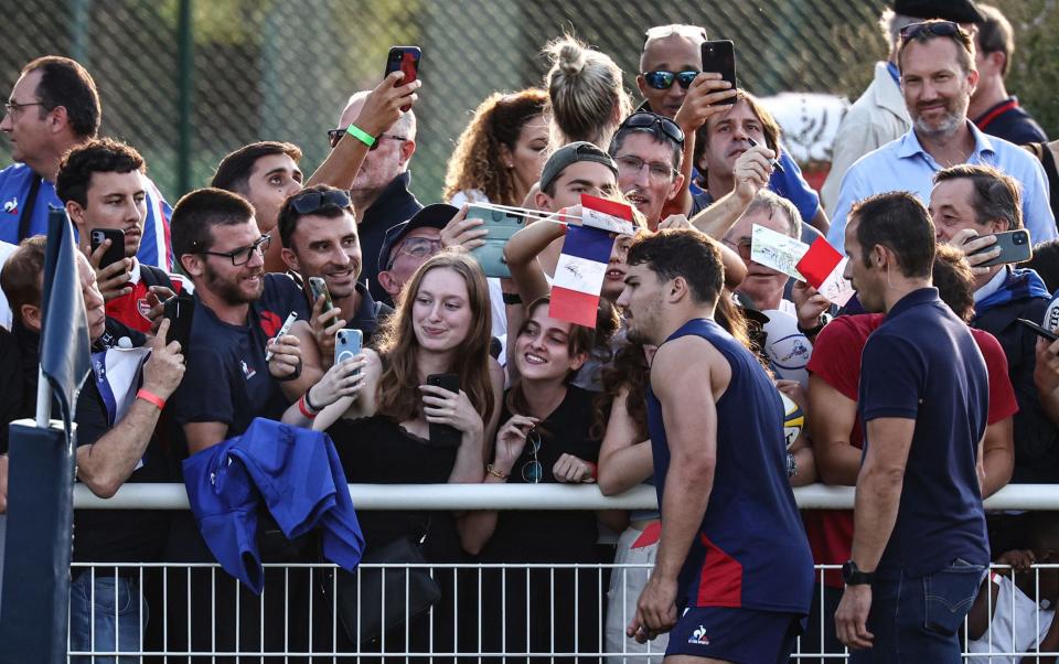 France fans flock to get a selfie with their hero, Antoine Dupont