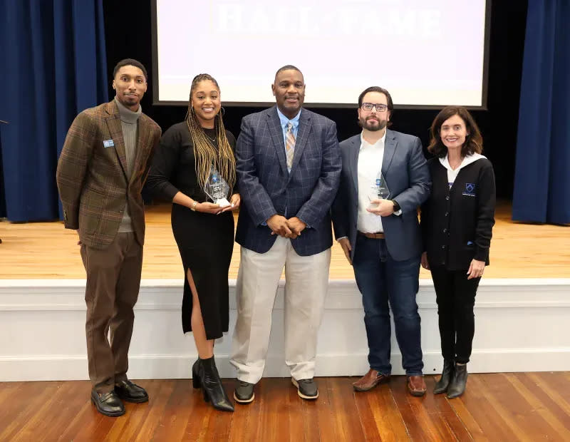 Summit Country Day School inducted two new members into the school's Athletic Hall of Fame. Dr. Ashley Hite (second from left) and Hugh McManus (second from right) were recognized in a ceremony on Friday, Feb. 10, 2024.