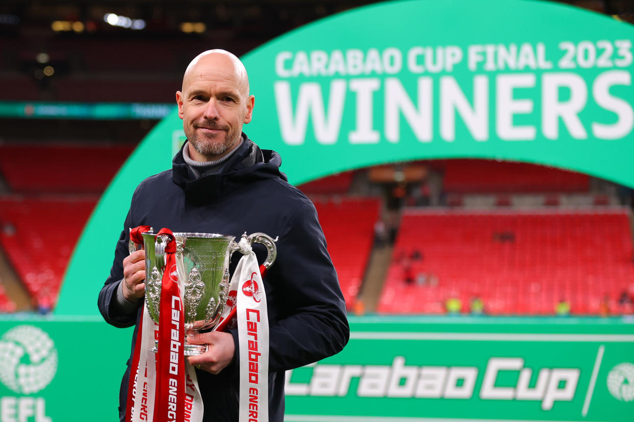 Manchester United manager Erik ten Hag with the Carabao Cup trophy after winning the final against Newcastle. 