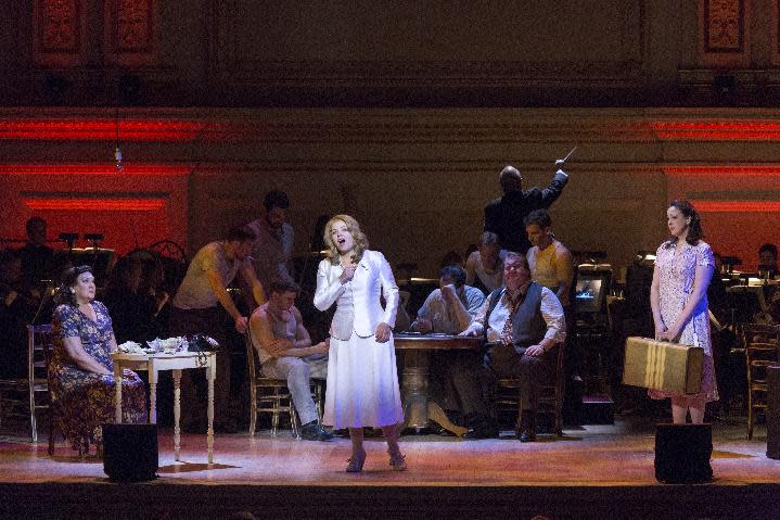 This March 14, 2013 publicity photo provided by Carnegie Hall shows, from left, Victoria Livengood, Mezzo-Soprano as Eunice Hubbell, Renée Fleming, Soprano as Blanche DuBois and Susanna Phillips, Soprano as Stella Kowalski, in a scene from Andre Previn's, "A Streetcar Named Desire," in the Stern Auditorium, at Carnegie Hall in New York. (AP Photo/Carnegie Hall, Richard Termine)