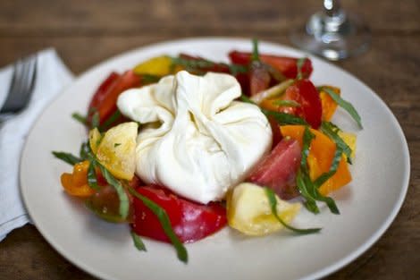 Update your caprese salad with rich, buttery burrata instead of mozzarella. Look who's classy now.