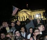 People gather at the White House late on 1 May 2011 to celebrate the death of Osama Bin Laden. AFP Photo / Chris Kleponis
