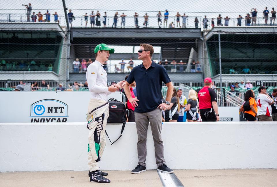 Juncos Hollinger Racing driver Callum Ilott (77) talks with former Indianapolis 500 winner Ryan Hunter-Reay Saturday, May 21, 2022, during qualifying for the 106th running of the Indianapolis 500 at Indianapolis Motor Speedway.