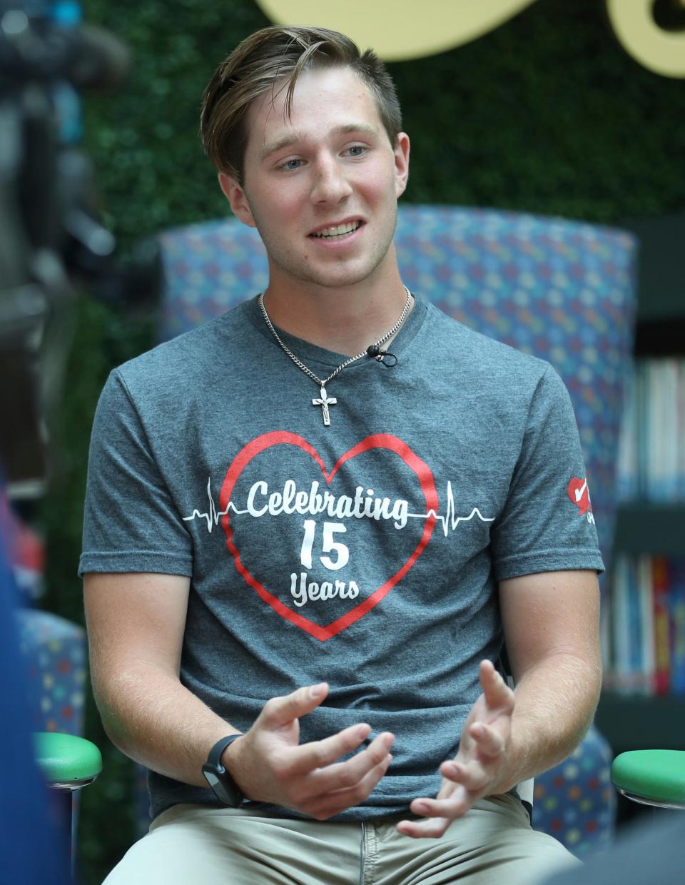 Alex Bowerson, 18, experienced sudden cardiac arrest during wrestling practice at Memphis High School talks about the importance of having AED devices like the one used to shock his heart out of its fatal rhythm in schools Thursday, July 20, 2023.