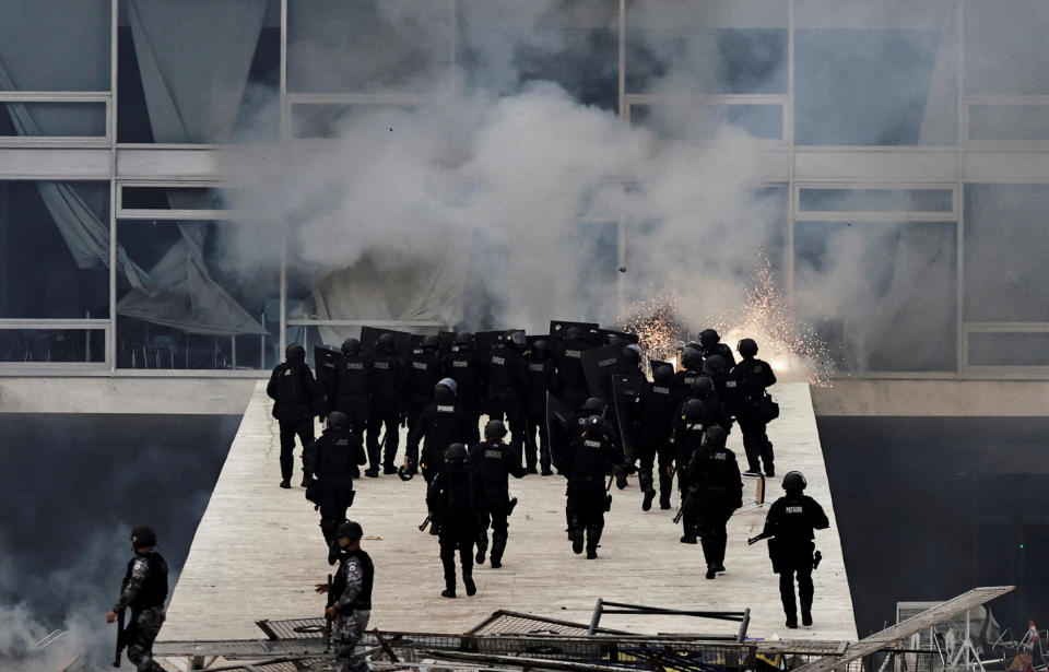 Security forces operate as supporters of Brazil's former President Jair Bolsonaro demonstrate against President Luiz Inacio Lula da Silva, in Planalto Palace, in Brasilia, Brazil, January 8, 2023. (Ueslei Marcelino/Reuters)