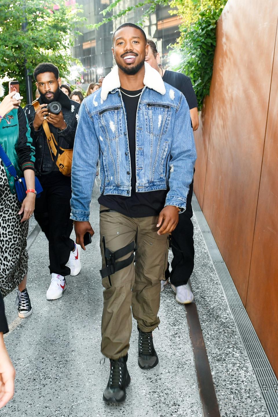 Michael B. Jordan steps out in a chic and cozy look for the spring 2020 Coach runway show on Tuesday at the High Line in N.Y.C.