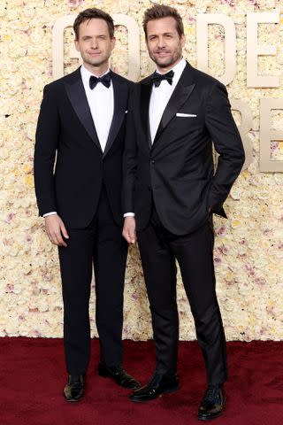 <p>Monica Schipper/GA/The Hollywood Reporter via Getty</p> Patrick J. Adams and Gabriel Macht attend the 81st Annual Golden Globe Awards