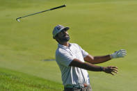 Sahith Theegala throws his club while after hitting on the 18th hole during the third round of the Travelers Championship golf tournament at TPC River Highlands, Saturday, June 25, 2022, in Cromwell, Conn. (AP Photo/Seth Wenig)