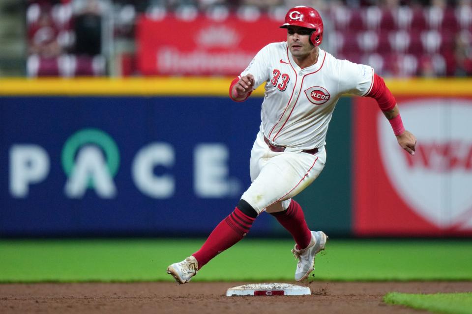 Cincinnati Reds first baseman Christian Encarnacion-Strand is known for his 'ridiculous power' and his simple and effective approach at the plate.