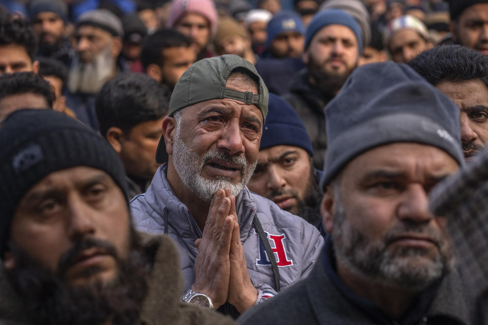 Kashmiris offer special prayers in the compound of Jamia Masjid or Grand Mosque in Srinagar, Indian controlled Kashmir, Friday, Jan. 12, 2024. Special congregational prayers known as "Salatul Istisqa" were organized by Anjuman Aquaf Jamia Masjid for respite from the prevailing dry weather conditions in Kashmir valley. (AP Photo/Dar Yasin)