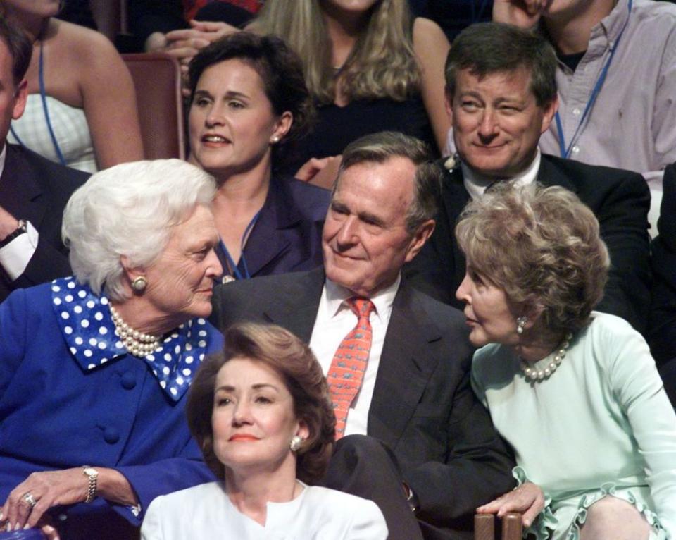 From left: Barbara Bush, George H. W. Bush and Nancy Reagan at the Republican National Convention in 2000