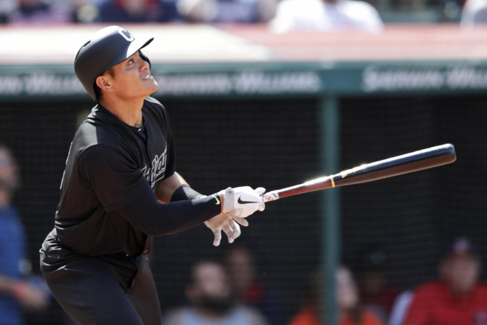 Cleveland Indians' Yu Chang watches his ball after hitting a triple in the seventh inning in a baseball game against the Kansas City Royals, Sunday, Aug. 25, 2019, in Cleveland. (AP Photo/Tony Dejak)