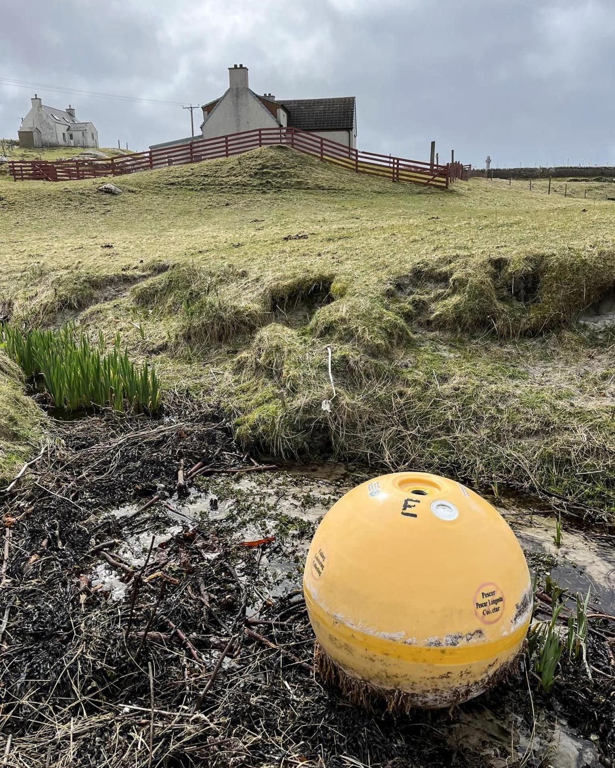 <span>A buoy from Florida floated all the way across the Atlantic Ocean to the Scottish isle of Eriskay.</span><span>Photograph: Maryann Macintyre</span>