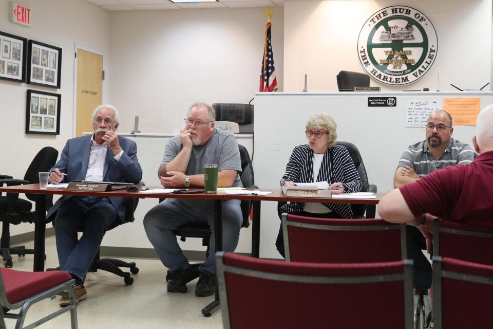 From left, Brewster Trustee George Gaspar, Mayor James Schoenig, Trustee Mary Bryde, and Trustee Thomas Boissonnault, during a recent village board meeting in Brewster May 18, 2022. 