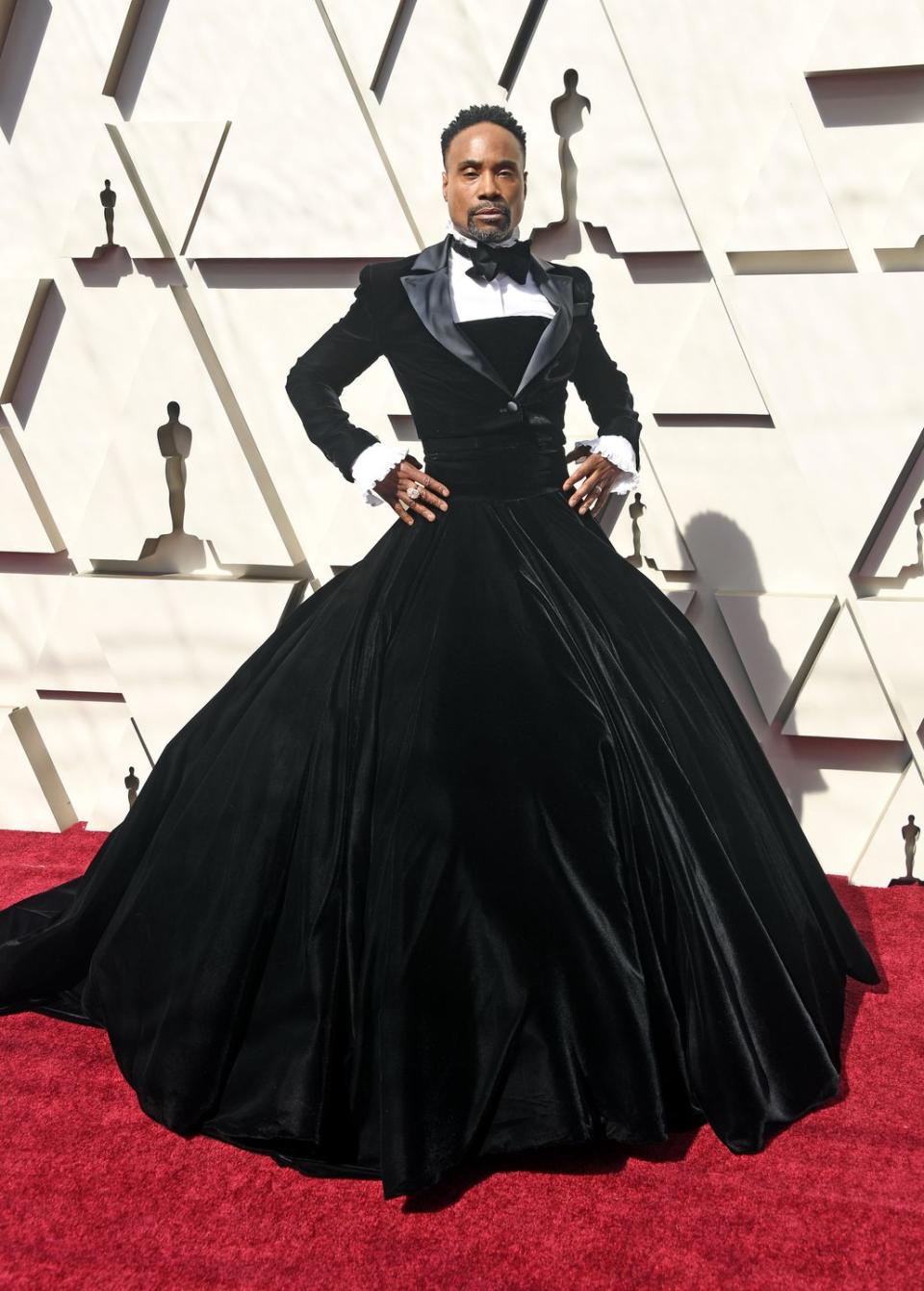 <p>This was the moment Billy Porter 'won' the Oscars red carpet. </p><p>Wearing a black velvet Christian Siriano ballgown and matching tuxedo jacket, he described his outfit as <a href="https://www.elle.com/culture/movies-tv/a26500852/billy-porter-christian-siriano-oscars-2019-red-carpet/" rel="nofollow noopener" target="_blank" data-ylk="slk:'political art'.;elm:context_link;itc:0;sec:content-canvas" class="link ">'political art'.</a><br></p><p>Porter later shared a photo of the dress on <a href="https://www.instagram.com/p/BuSF3dEl_e0/" rel="nofollow noopener" target="_blank" data-ylk="slk:Instagram;elm:context_link;itc:0;sec:content-canvas" class="link ">Instagram</a> and wrote: 'When you come to the Oscars, you must dress up. Thanks @csiriano for creating this custom couture masterpiece. @oscarheyman you have outdone yourselves once again with your iconic jewels.'</p>