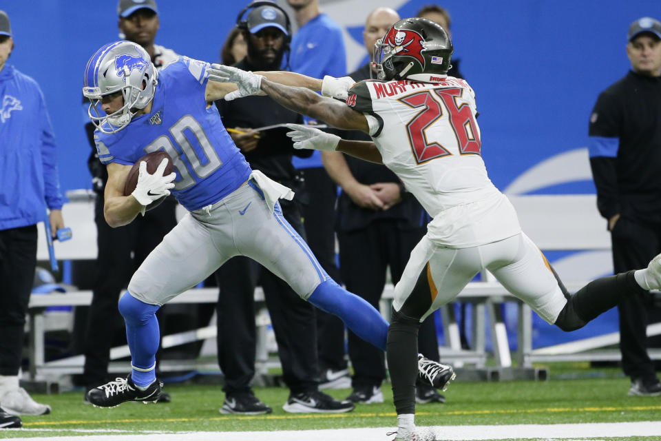 Detroit Lions wide receiver Danny Amendola (80) is pushed out of bounds by Tampa Bay Buccaneers defensive back Sean Murphy-Bunting (26) during the first half of an NFL football game, Sunday, Dec. 15, 2019, in Detroit. (AP Photo/Duane Burleson)