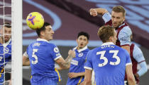 West Ham's Tomas Soucek, right, scores his side's second goal during the English Premier League soccer match between West Ham and Brighton in London, England, Sunday, Dec. 27, 2020. (AP Photo/Kirsty Wigglesworth, Pool)