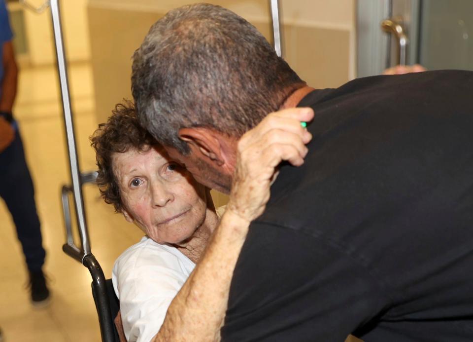 Yocheved Lifshitz, one of the two women released from Hamas captivity late Monday, sitting in a wheelchair at the hospital in Tel Aviv, Israel (AP)