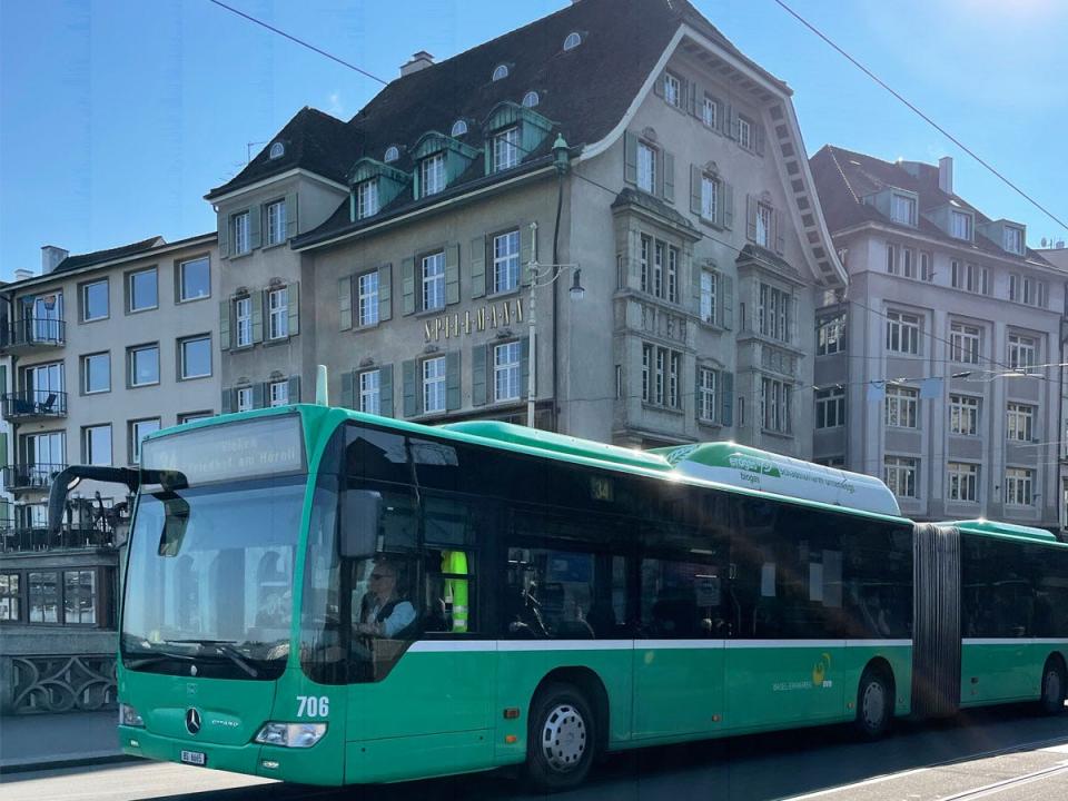 bus in switzerland in front of buildings