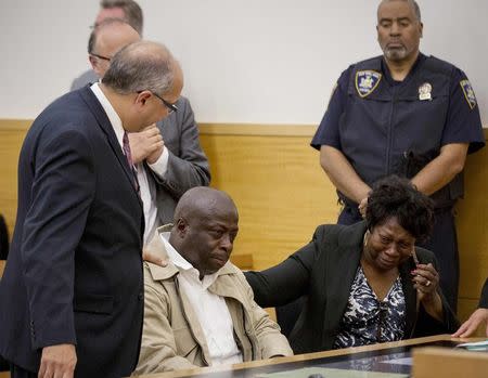 David McCallum reacts after hearing his conviction was overturned at Brooklyn Supreme Court in the Brooklyn Borough of New York October 15, 2014. REUTERS/Brendan McDermid