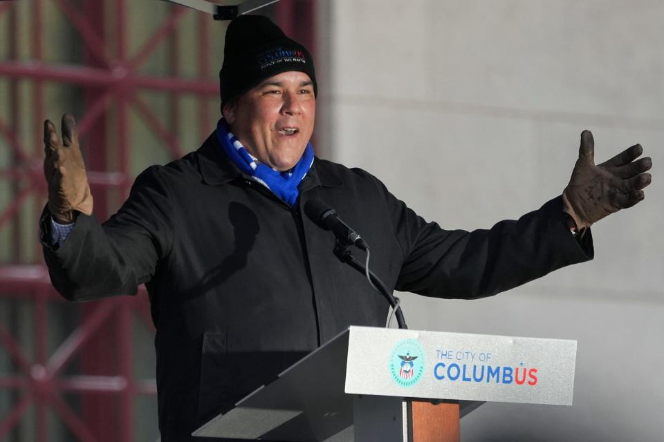 Mayor Andrew J. Ginther addresses the crowd before a MLK March at City Hall on Jan. 17.