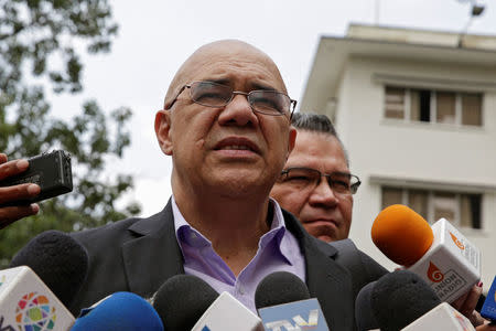 Jesus Torrealba, secretary of Venezuela's coalition of opposition parties (MUD), talks to the media after a meeting at the Apostolic Nunciature in Caracas, Venezuela September 28, 2016. REUTERS/Marco Bello