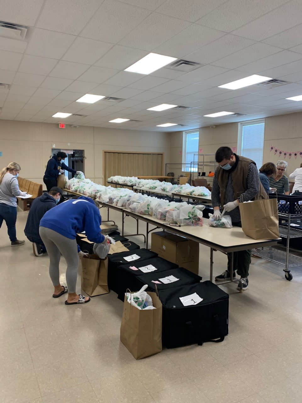 Mobile Meals volunteers are wearing masks as a precaution. (Photo: Mobile Meals)