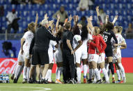 Canadian team celebrate after their 1-0 win in their Women's World Cup Group E soccer match between Canada and Cameroon in Montpellier, France, Monday, June 10, 2019. (AP Photo/Claude Paris)