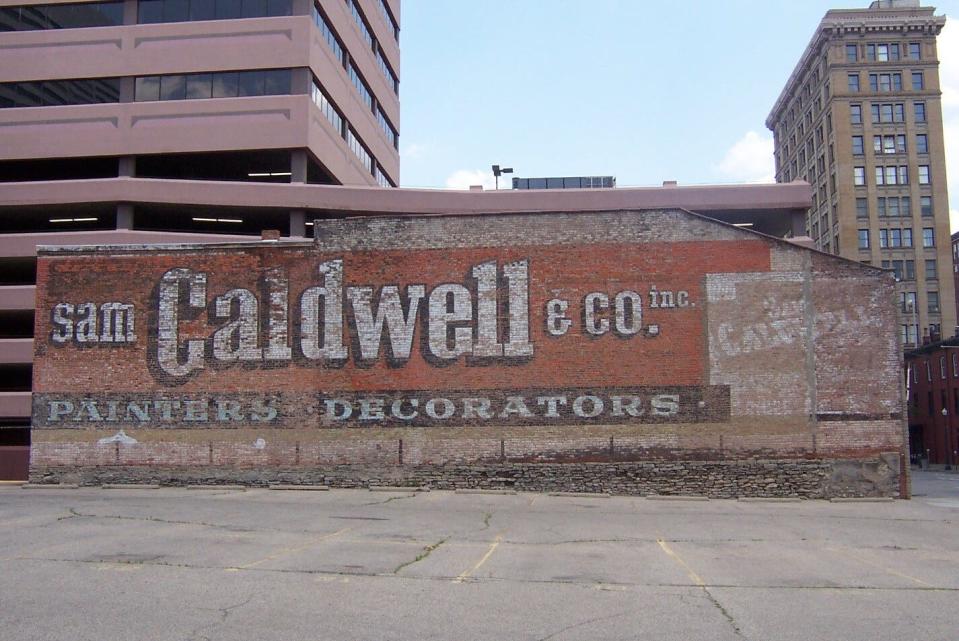 Sign painters at the Sam Caldwell & Co. Inc. did this company ghost sign on the wall of their garage on Ninth Street, Downtown.