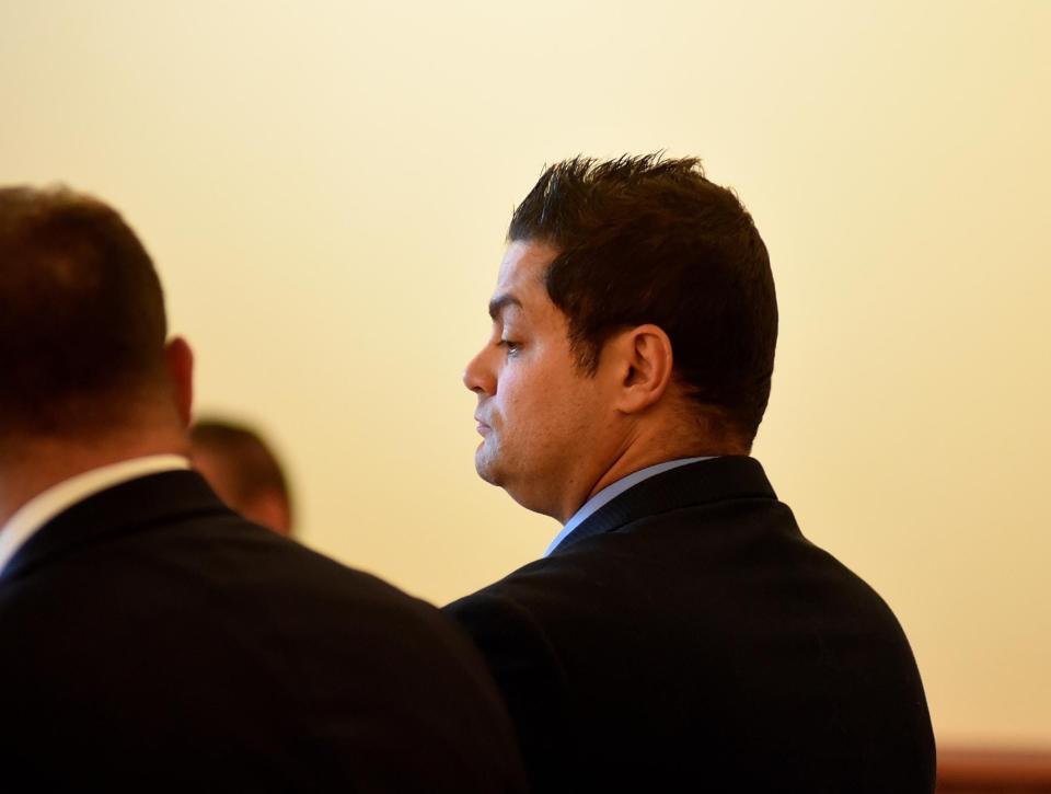 Former police officer Michael Pessoa at his arraignment in June 2019.