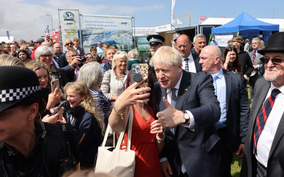 Boris Johnson takes a selfie as he attends the Royal Cornwall Show today - BPM Media 