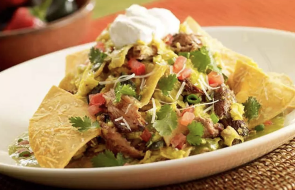 The Cheesecake Factory's Green Chilaquiles With Carnitas and Eggs