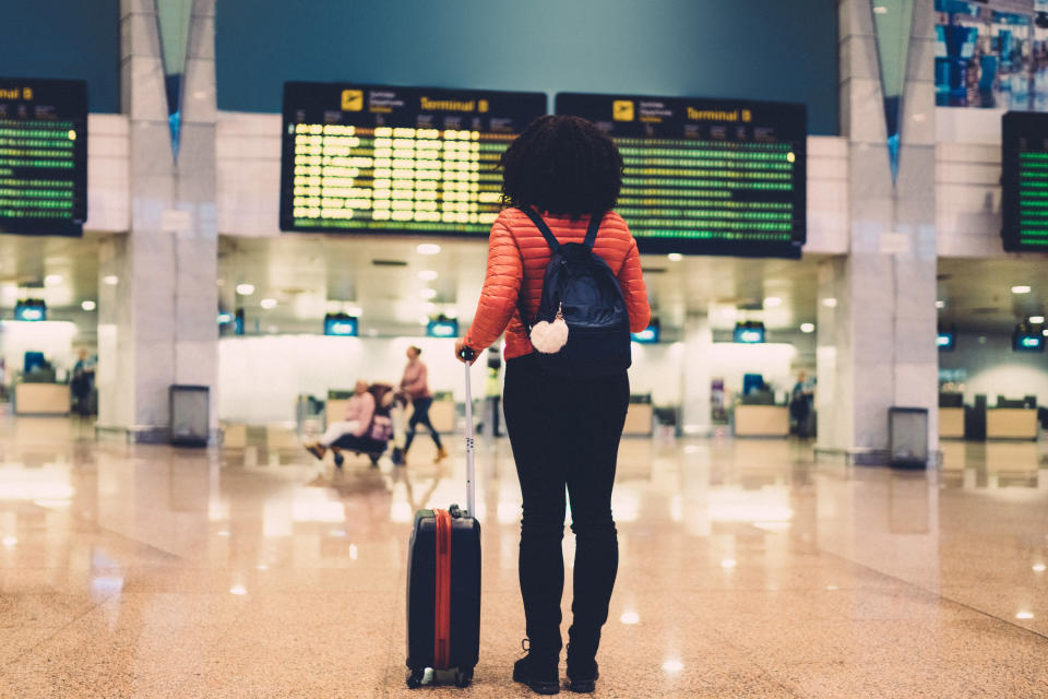 Pregnant traveler at airport