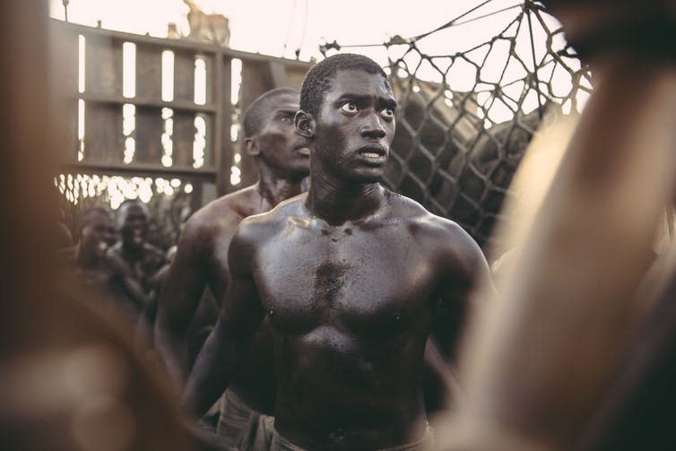 <span class="caption">Malachi Kirby as enslaved man Kunta Kinte, in the 2016 History Channel adaptation of Roots.</span> <span class="attribution"><span class="source">BBC/A+E</span></span>