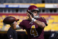 Washington Football Team quarterback Taylor Heinicke (4) throwing the ball during pregame warmups prior to the start of the first half of an NFL football game against the Kansas City Chiefs, Sunday, Oct. 17, 2021, in Landover, Md. (AP Photo/Patrick Semansky)