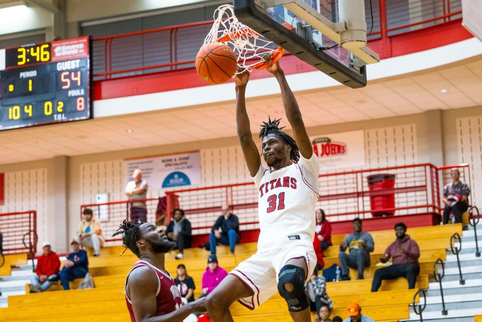 IUSB’s Dejon Barney dunks Action from the IUSB vs. Calument basketball game Wednesday, Feb. 8, 2023 on campus at IUSB. (Photo by Michael Caterina/Indiana University South Bend)