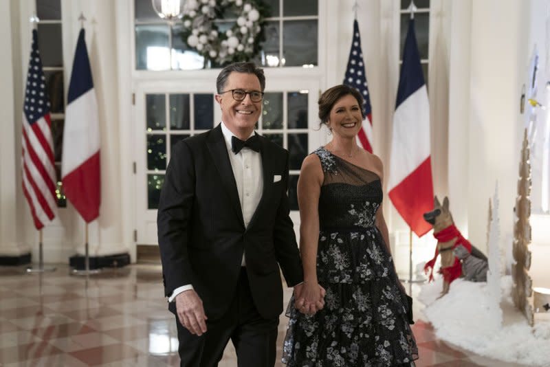 Stephen Colbert (L) and Evelyn McGee-Colbert attend a White House State Dinner in 2022. File Photo by Sarah Silbiger/UPI