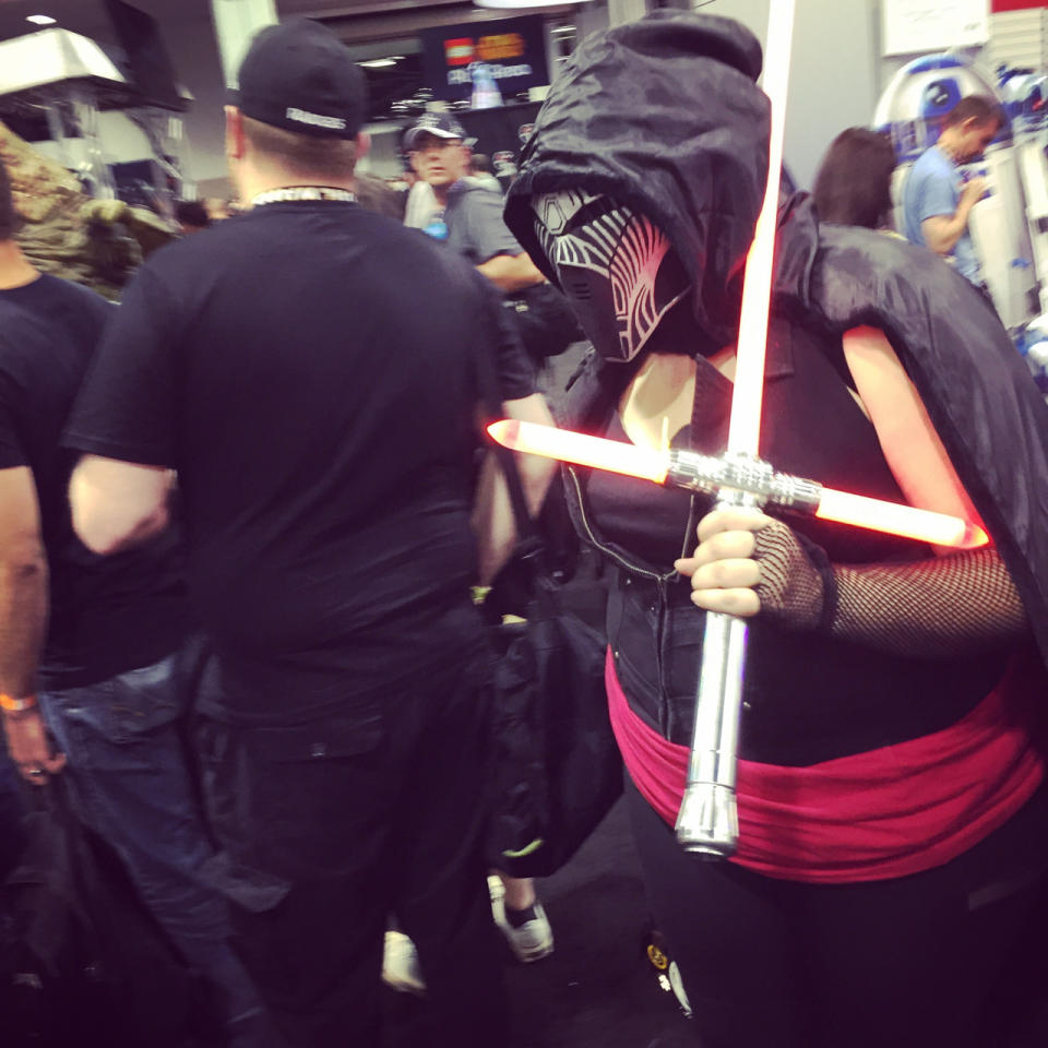 The new tri-blade saber was a big hit at the Celebration. But this Dark Sider needs to be careful where she sets that thing. Don’t need any unnecessary decapitations.