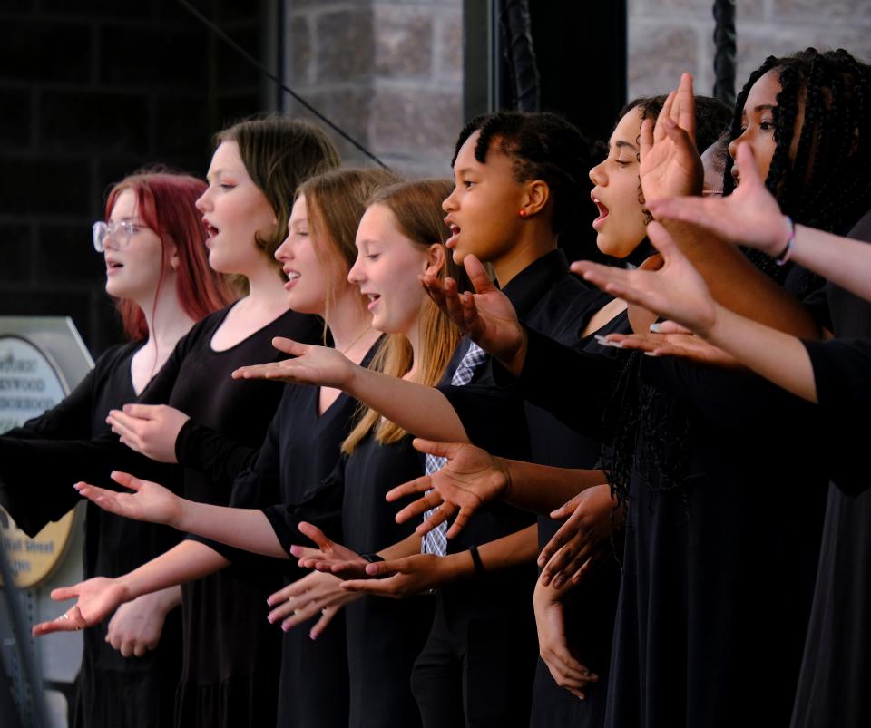 The Booker T. Washington Honor Select Choir performs at the dedication ceremony for Greenwood Rising, Black Wall Street History Center, Wednesday, June 2, 2021.