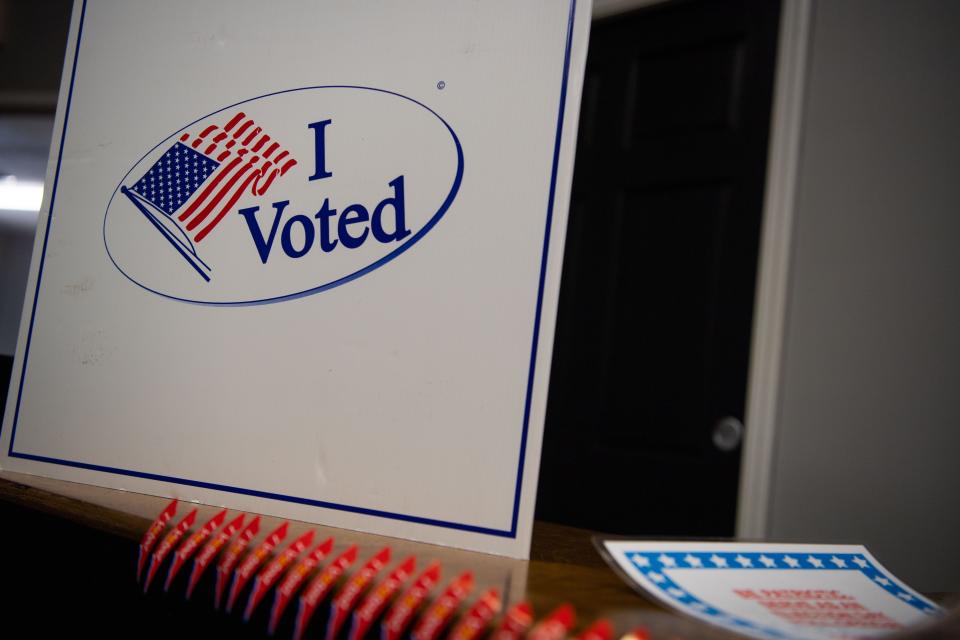 Voters visit the Franklin Christian Church, Tuesday, Oct. 26, 2021, to cast their vote during the local election.