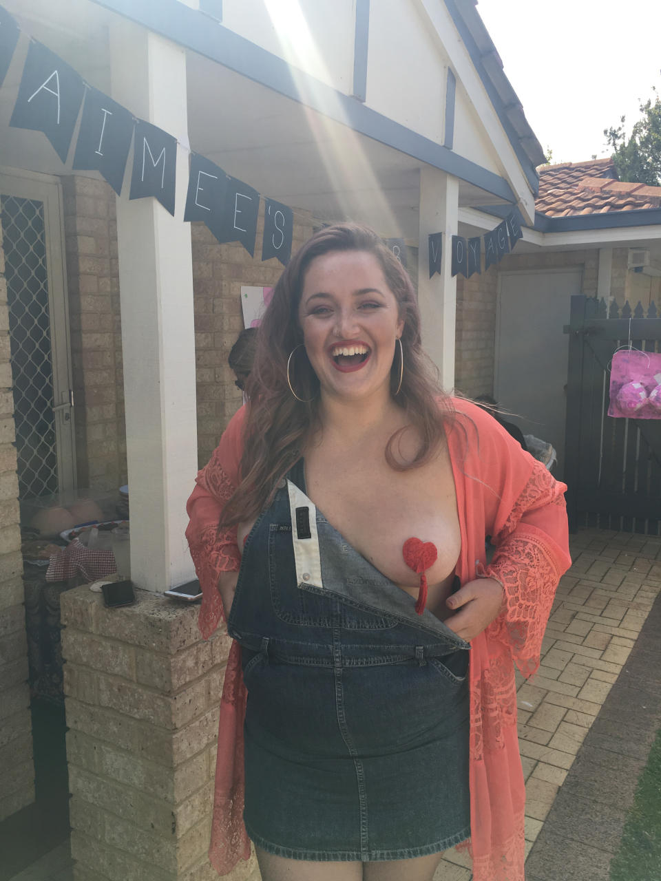 A photo of Jaimee Watts wearing nipple pasties at her 'goodbye boobs' party.