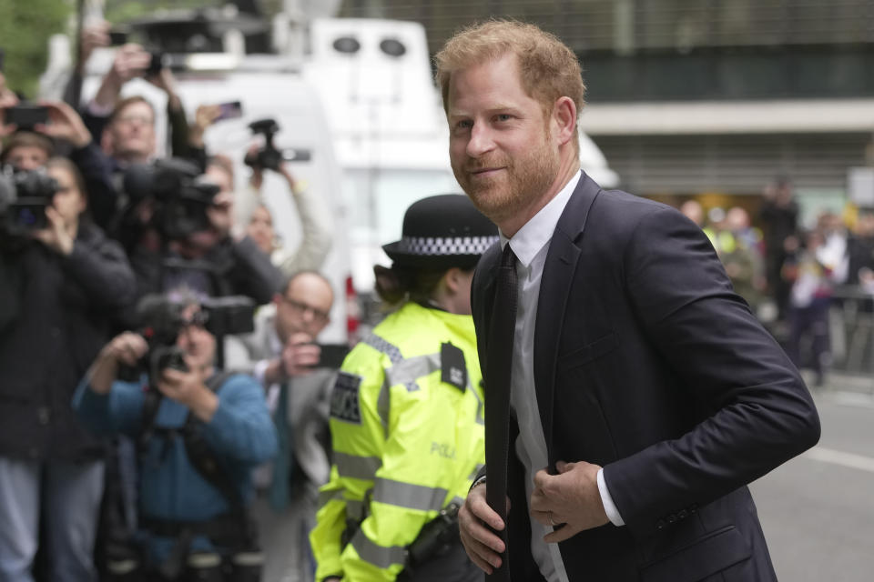 Prince Harry arrives at the High Court in London, Tuesday, June 6, 2023. Prince Harry is due at a London court to testify against a tabloid publisher he accuses of phone hacking and other unlawful snooping. Harry alleges that journalists at the Daily Mirror and its sister papers used unlawful techniques on an "industrial scale" to get scoops. Publisher Mirror Group Newspapers is contesting the claims. (AP Photo/Kin Cheung)