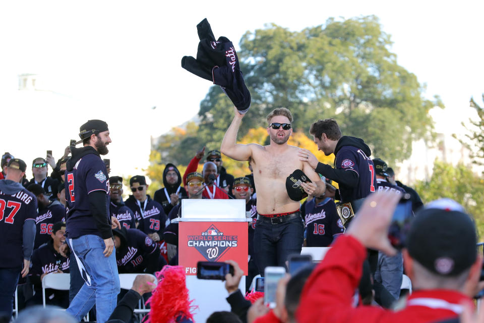 WASHINGTON, DC - NOVEMBER 02: Brian Dozier #9 of the Washington Nationals takes the stage during the 2019 World Series victory parade on Saturday, November 2, 2019 in Washington, D.C. (Photo by Alex Trautwig/MLB Photos via Getty Images)