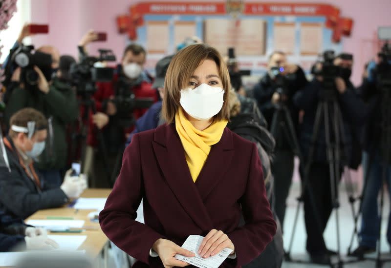 Maia Sandu, opposition candidate and former Prime Minister, visits a polling station during a presidential election in Chisinau