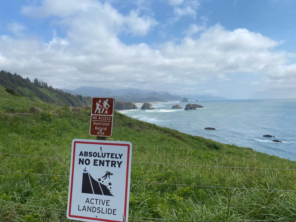 A sign marking an active landslide area at Ecola State Park in Cannon Beach.