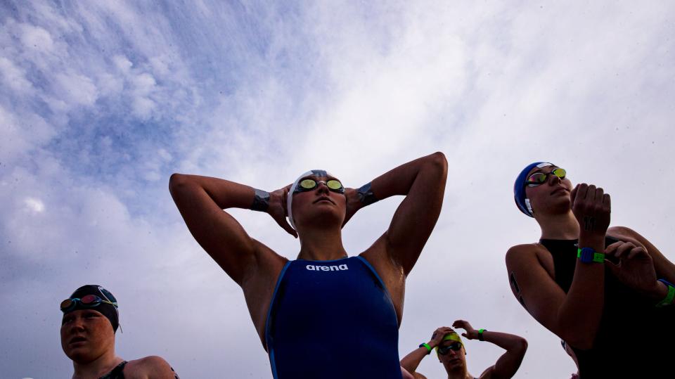 Kensey McMahon adjusts her goggles before the 10-kilometer race at April's U.S. Open Water National Championships in Fort Myers Beach.